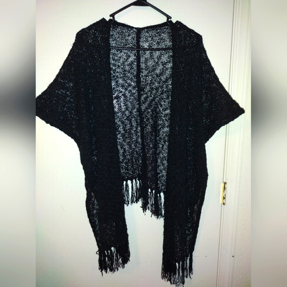 Knit poncho type cover